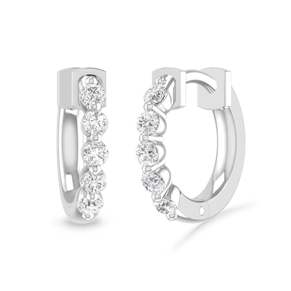 a pair of diamond earrings