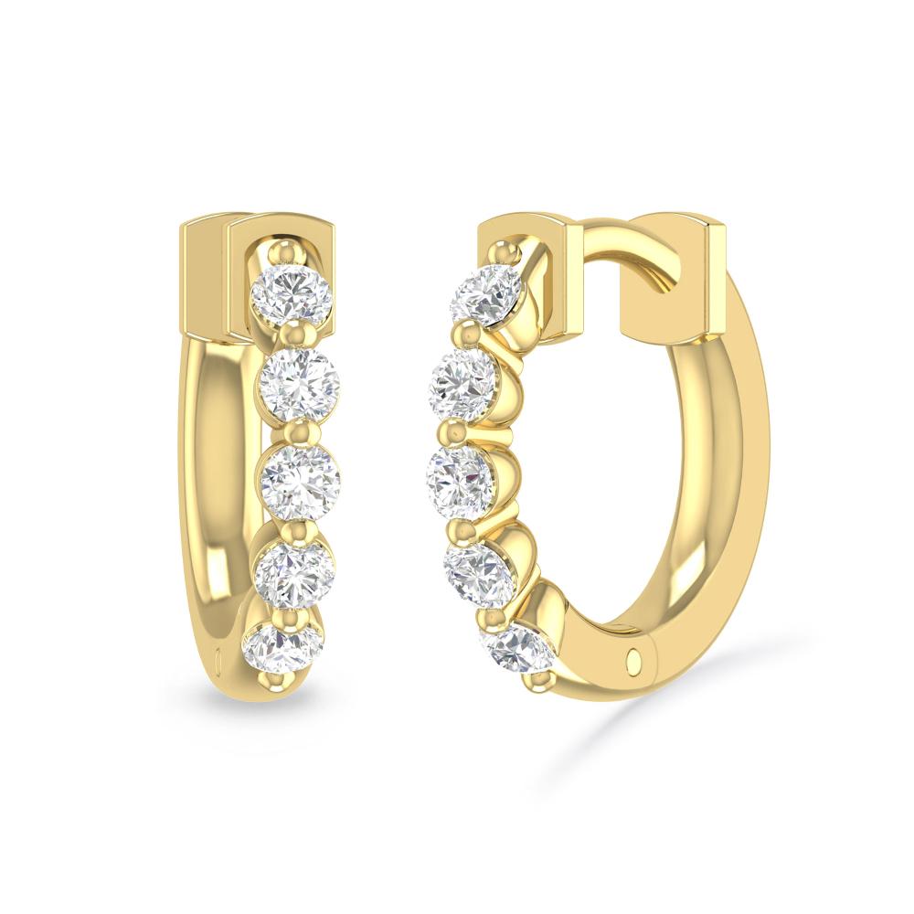 a pair of gold earrings with diamonds