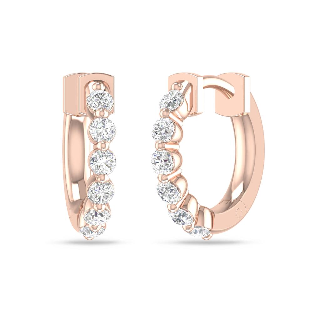 a pair of diamond earrings