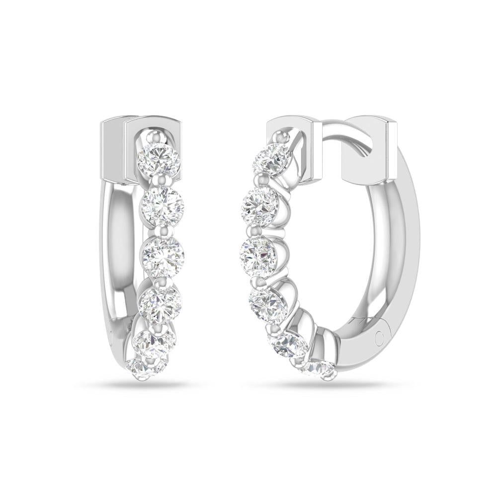 a pair of diamond earrings