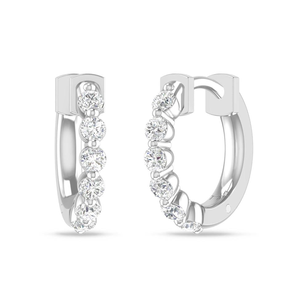 a pair of diamond earrings