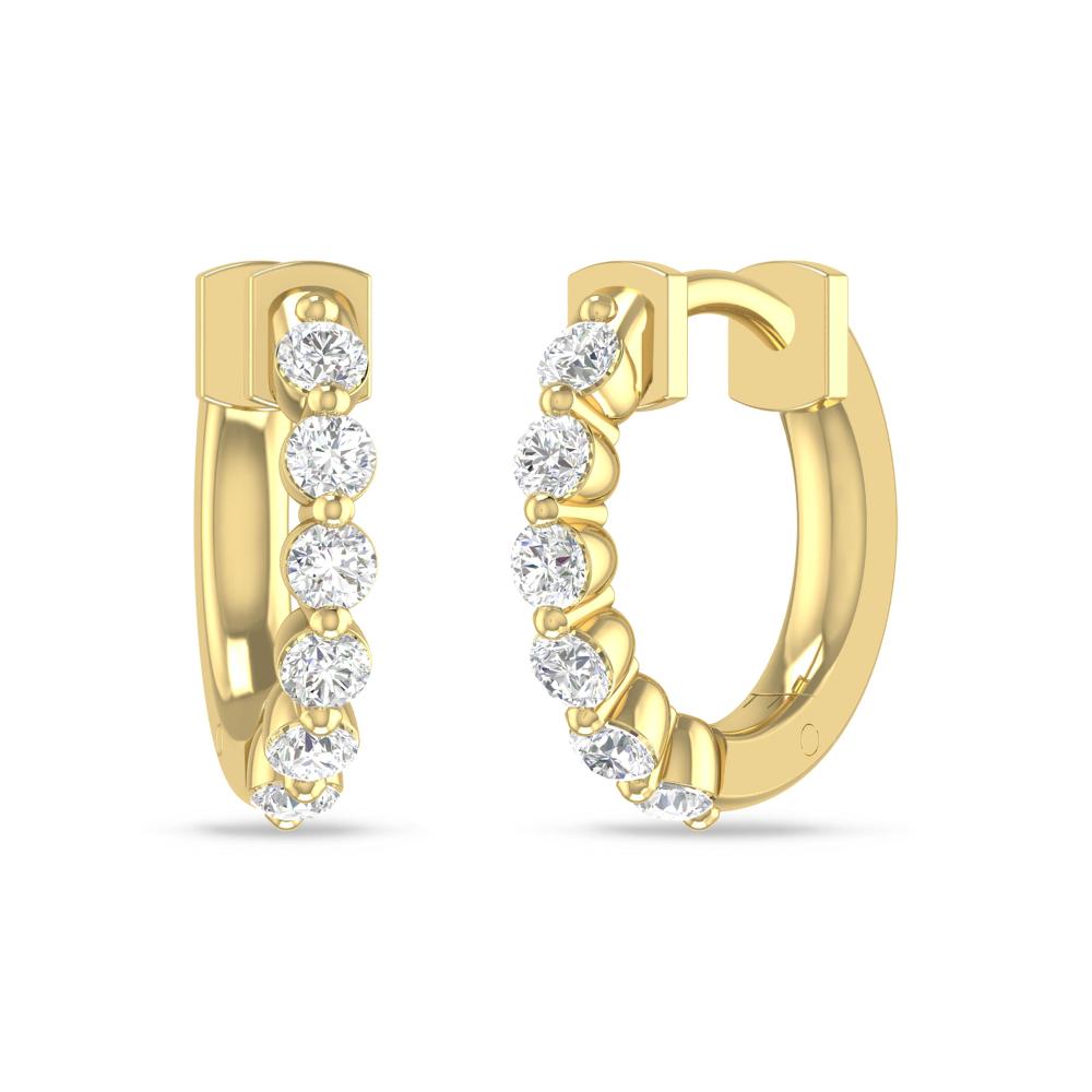 a pair of gold earrings with diamonds