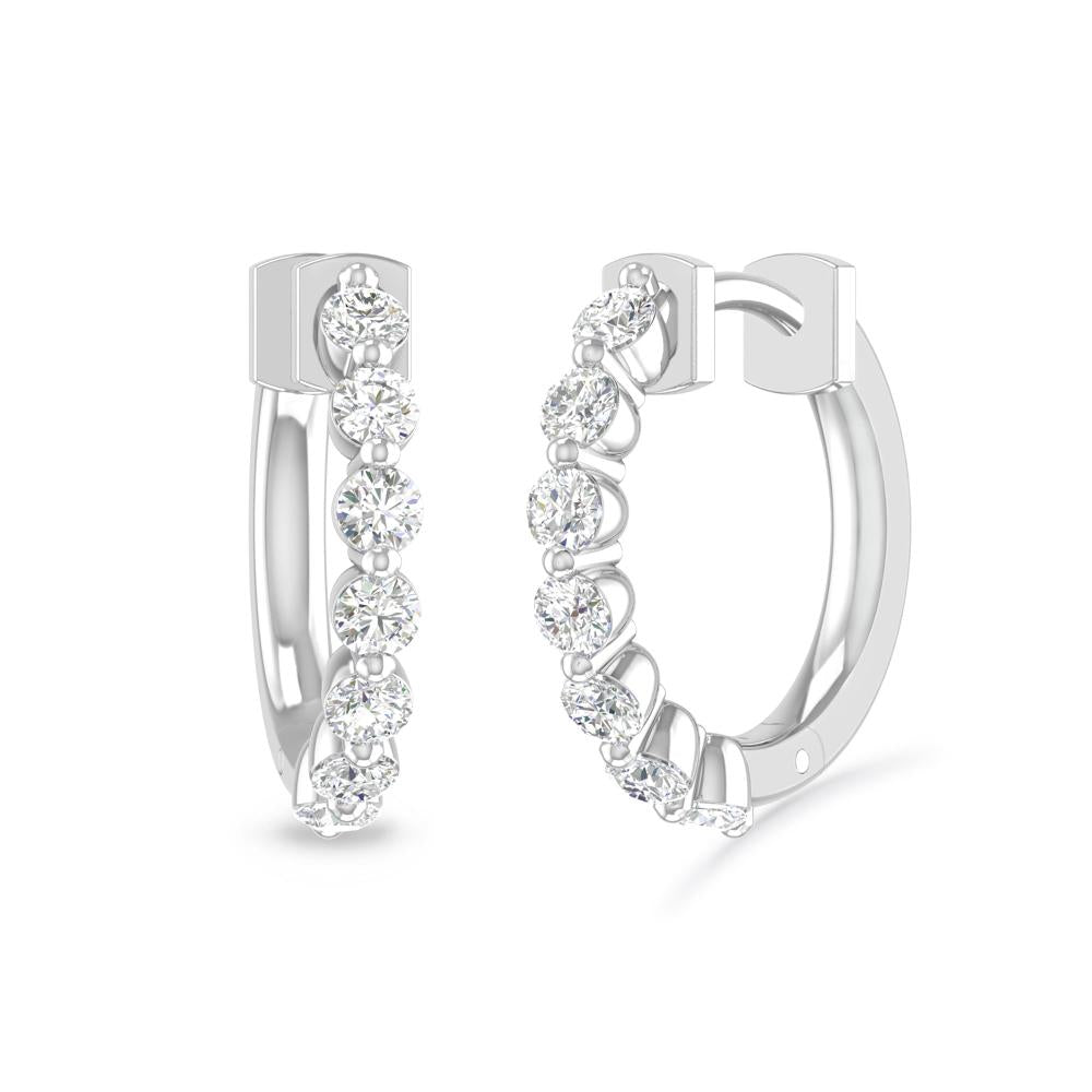 a pair of diamond earrings