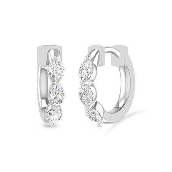 a pair of diamond earrings