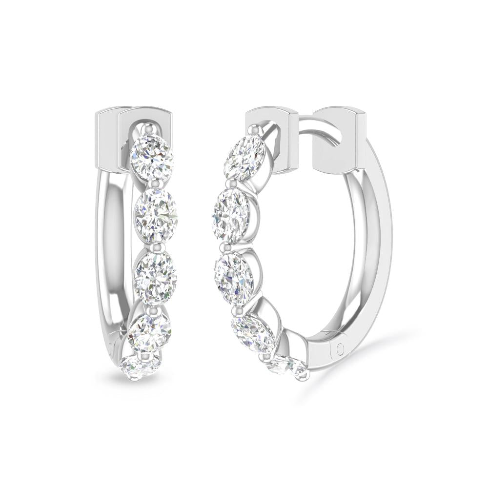 a pair of diamond earrings