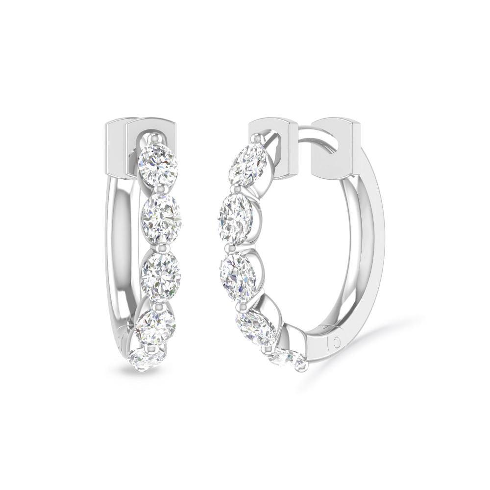 a pair of diamond earrings